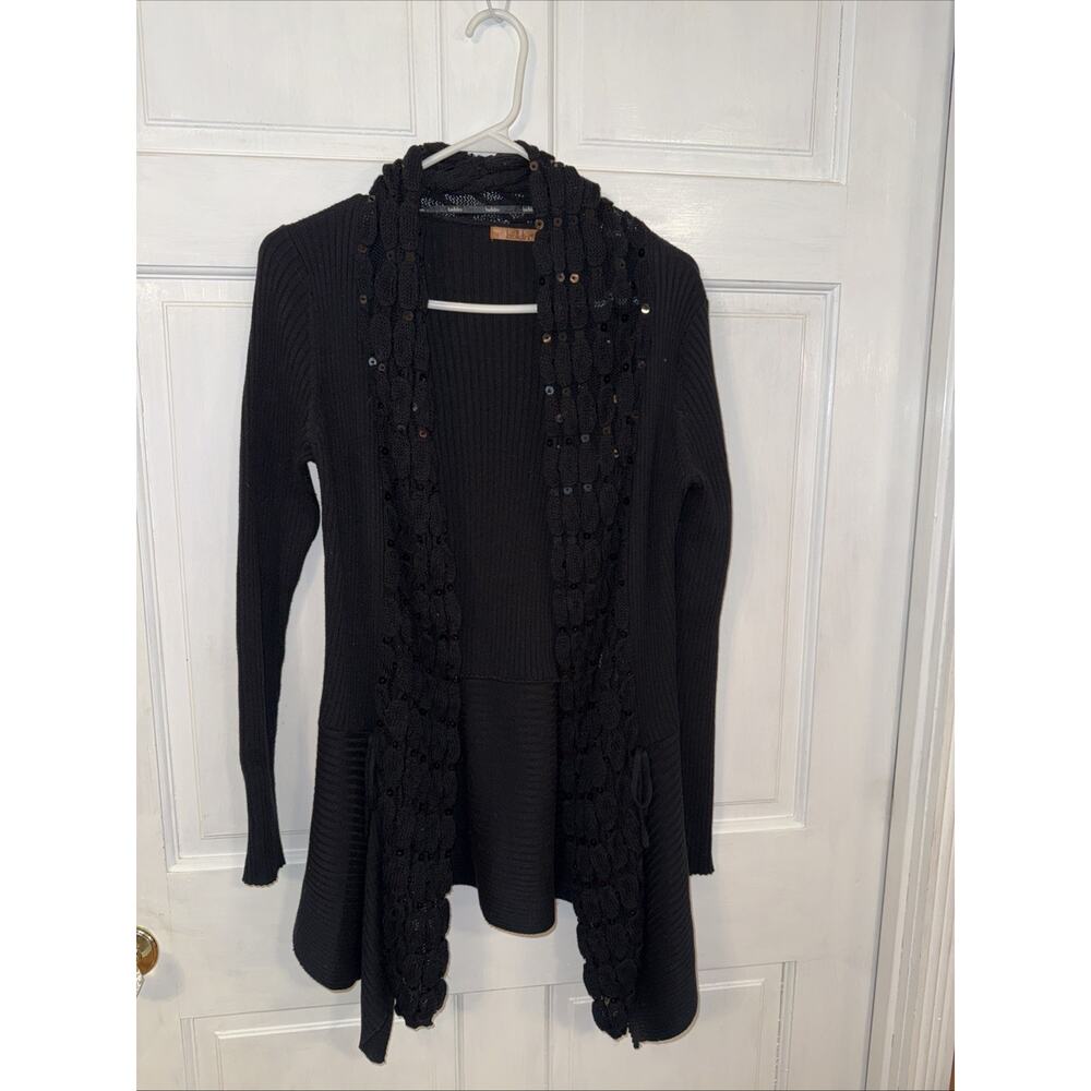 Bellini cardigan with a sequined and frilly open front. Size L